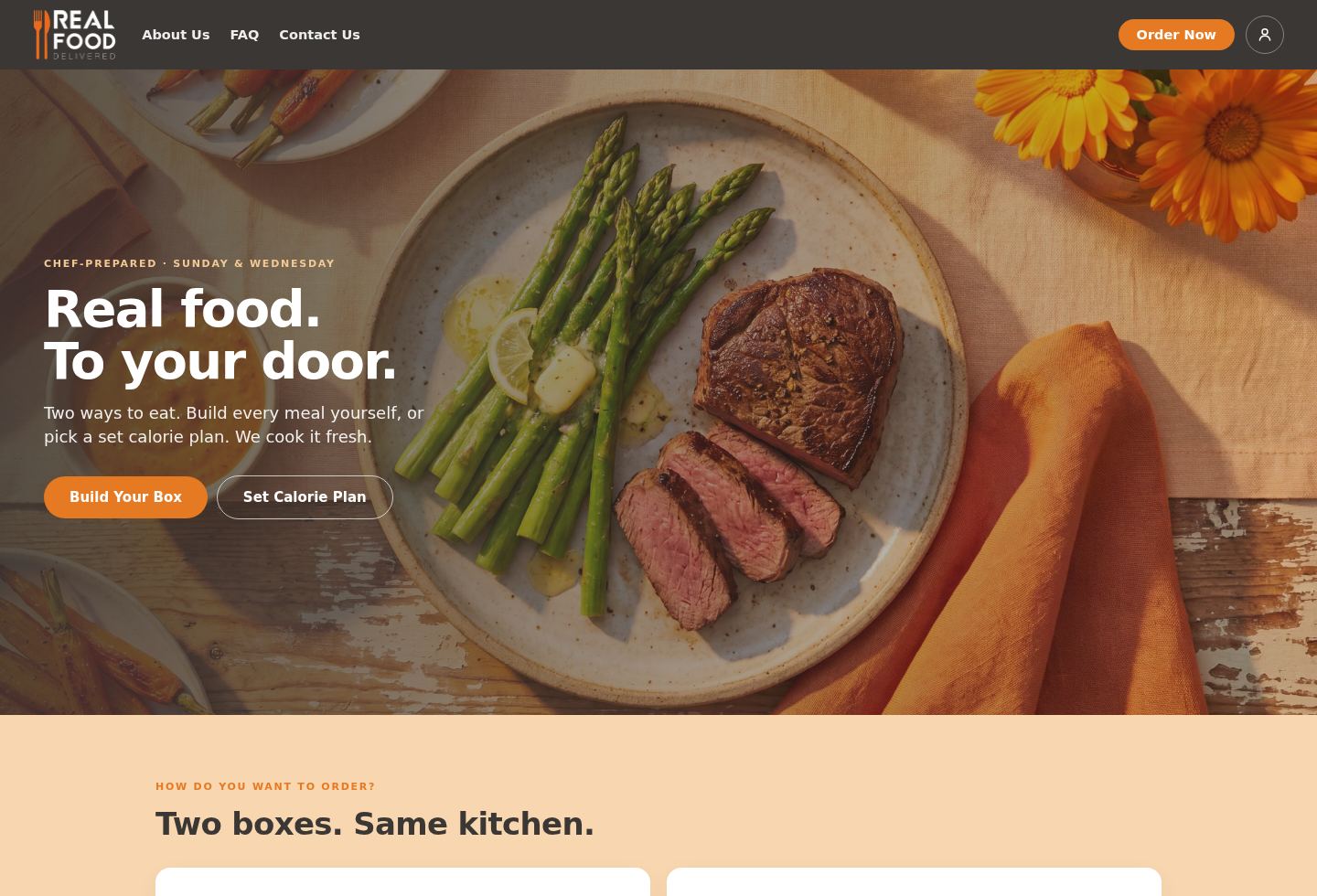 Real Food Delivered homepage. A steak and asparagus plate, with the headline Real food. To your door.
